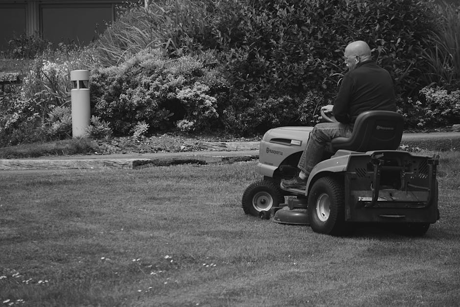 Riding lawn mower performing precision lawn care